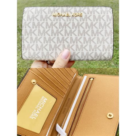 michael kors jet set item slim flap leather wallet|Michael Kors vanilla jet set.